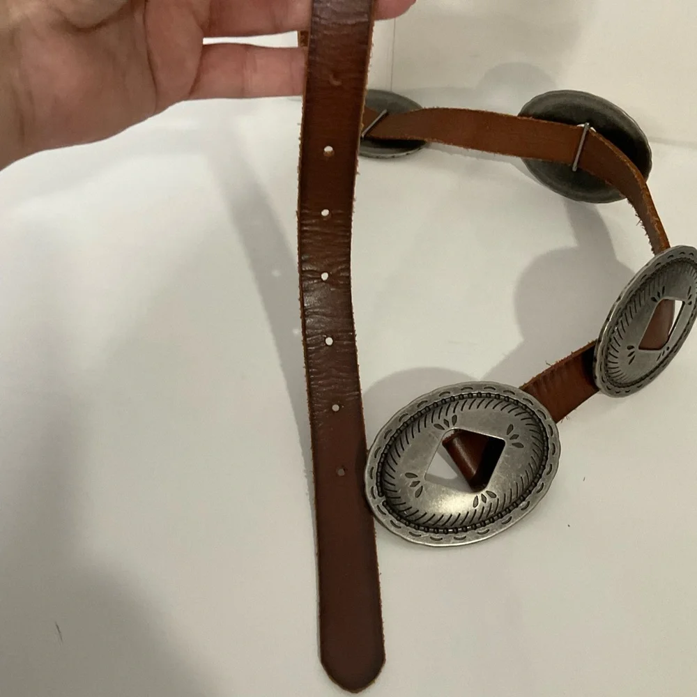 Vintage western brown leather belt; silver medallions; adjustable strap; ~37” L